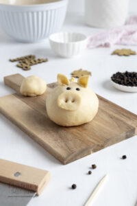 Anleitung zum Glückschweinchen formen